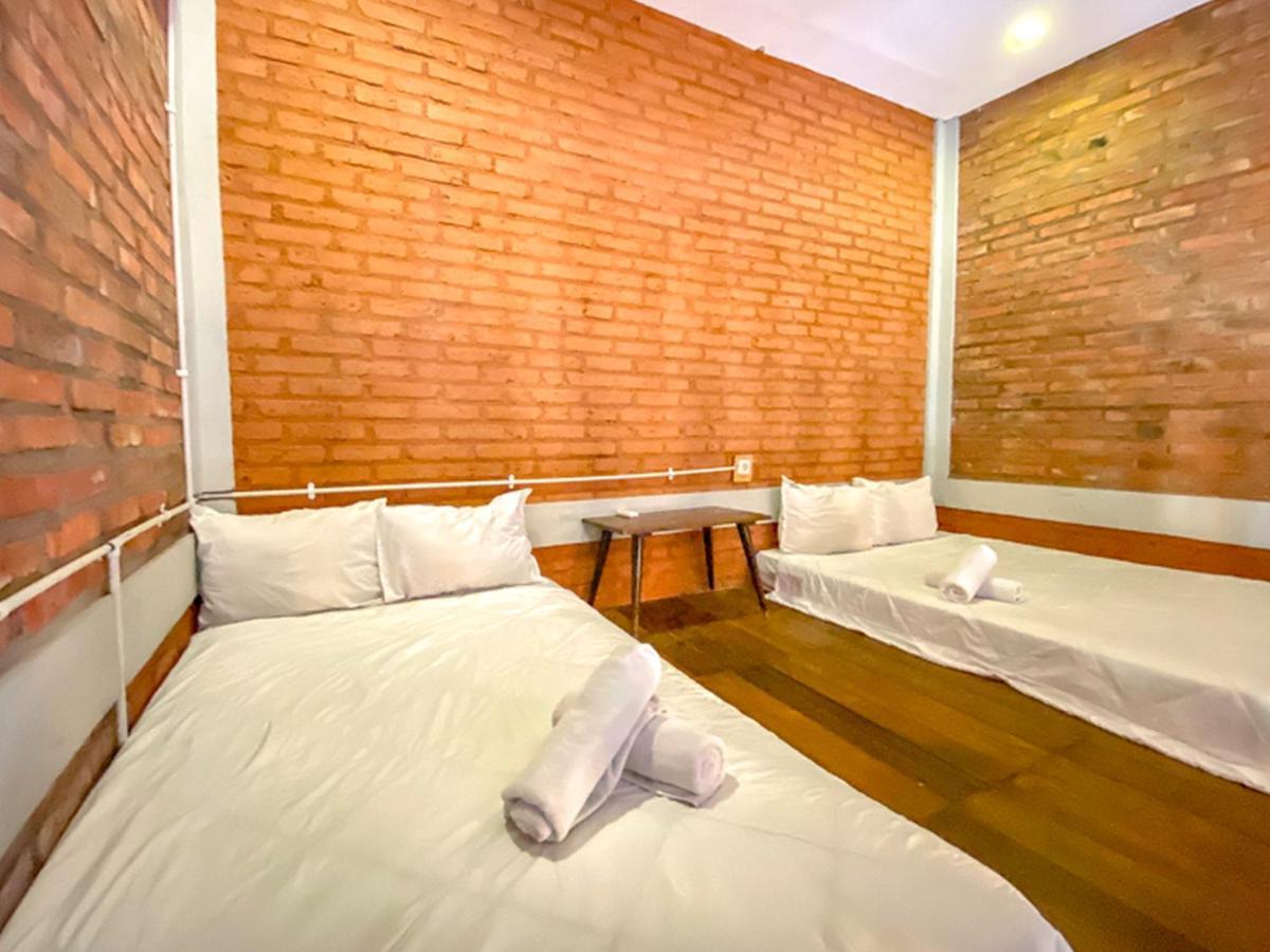 Griya Gribig Guest House Mitra Reddoorz Malang Exterior photo